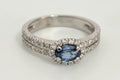 18ct White Gold Sapphire & 0.32ct Diamond Halo Engagement Ring