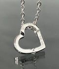 9K White Gold & Diamond Tension Set Heart Pendant