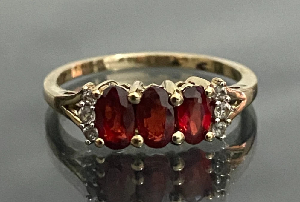 9ct Yellow Gold with 0.93CT Ruby Three Stone Ring Size K 1/2 (US 5.5)