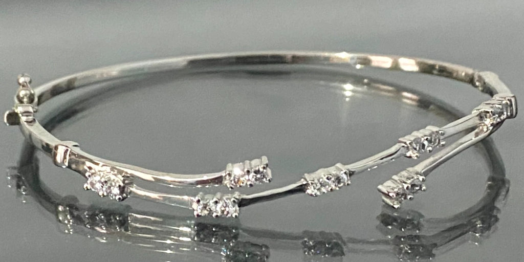 9ct White Gold & Cubic Zirconia Twist Hinged Oval Bangle - 62mm
