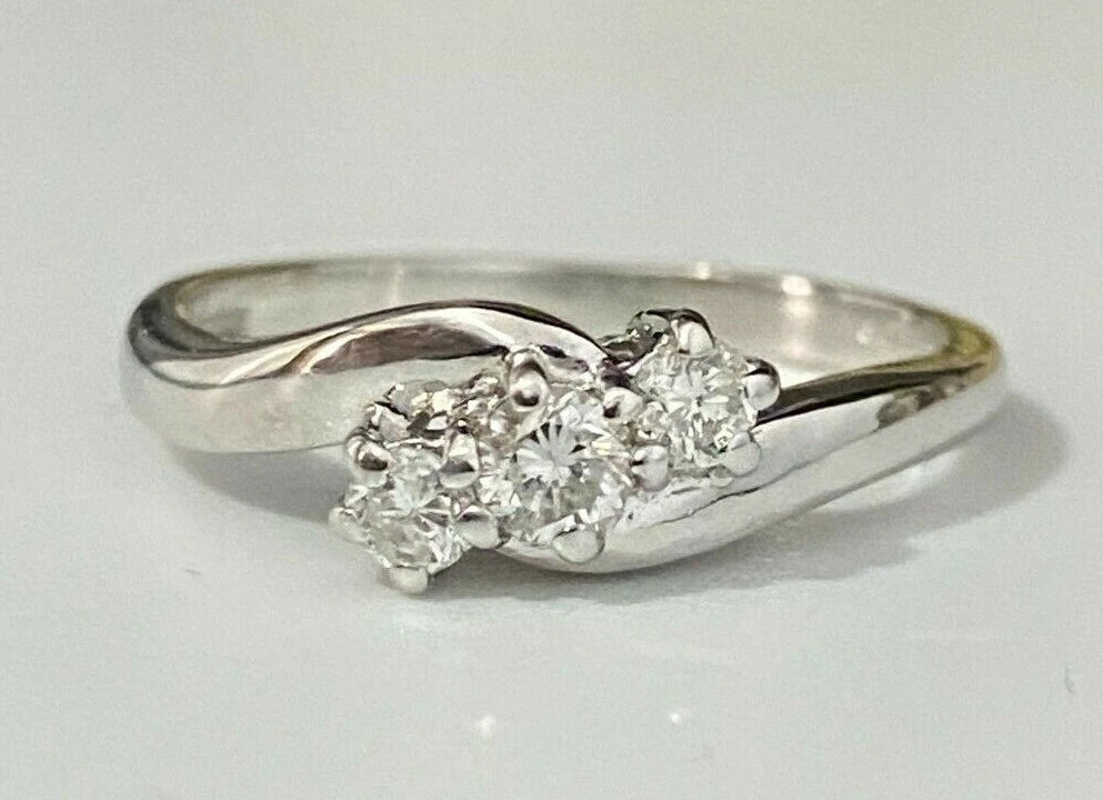 18K White Gold & 0.33CT Diamond Twist Three Stone Ring Size P - 7 1/2