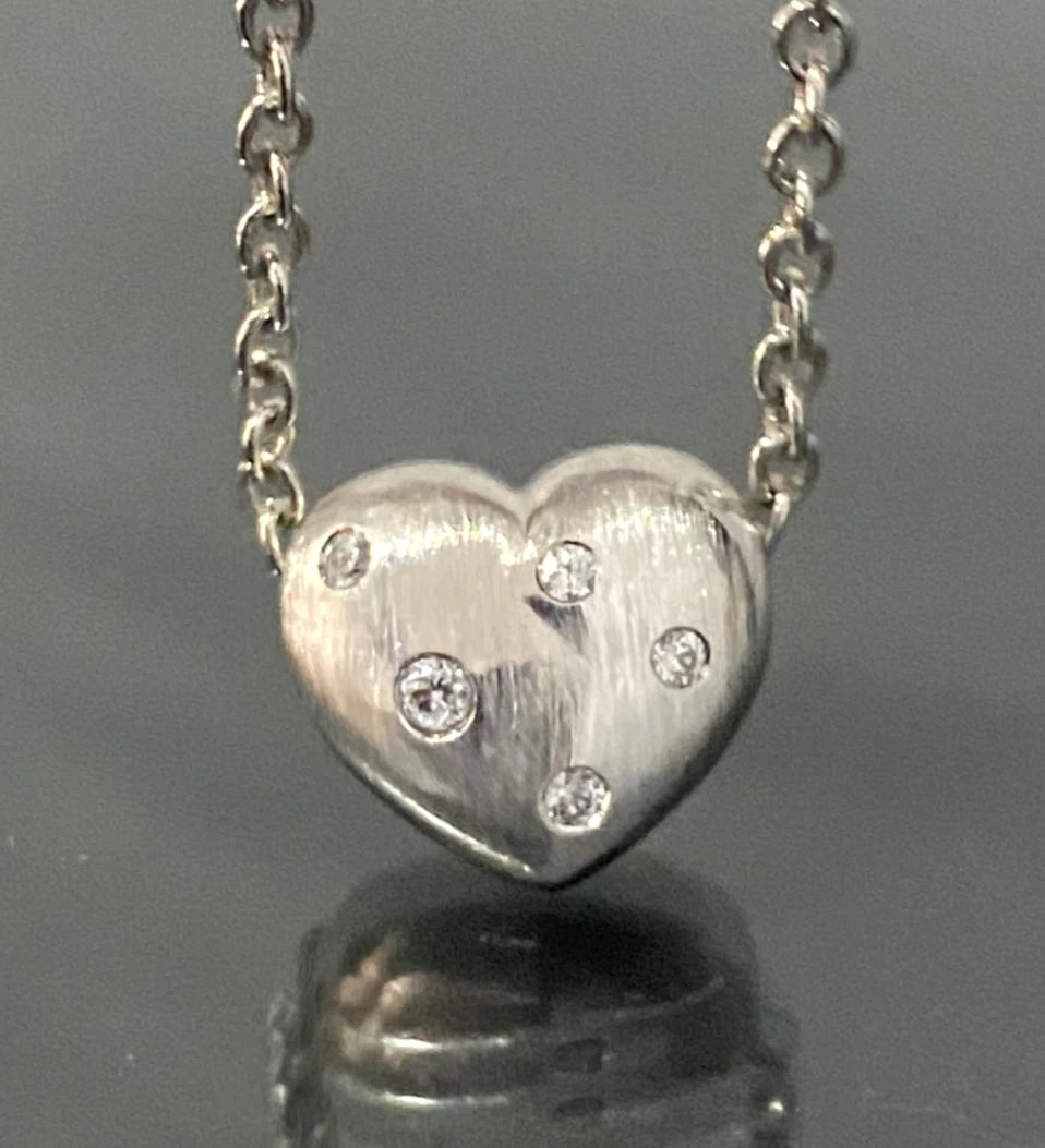 9K White Gold & Cubic Zirconia Flush Set Heart Pendant