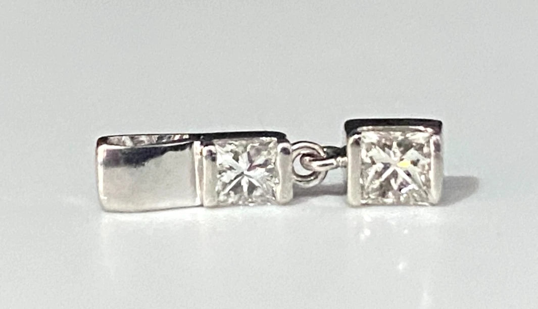 A 950 Platinum & 0.25CT Diamond Two Stone Pendant