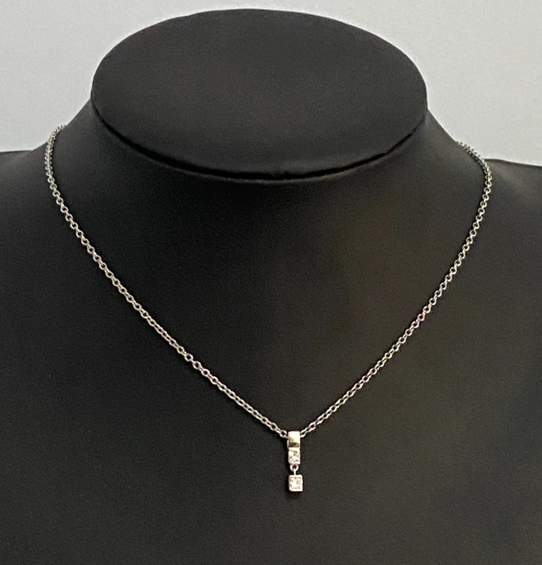 A 950 Platinum & 0.25CT Diamond Two Stone Pendant