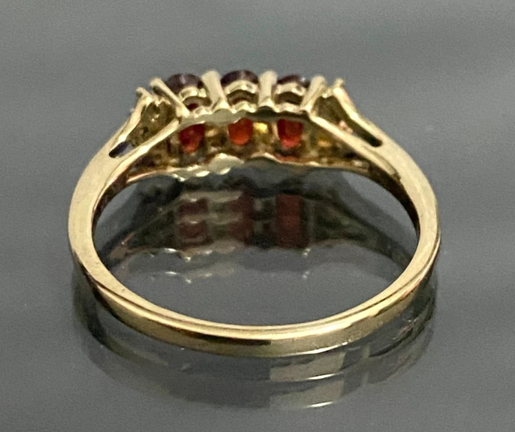 9ct Yellow Gold with 0.93CT Ruby Three Stone Ring Size K 1/2 (US 5.5)