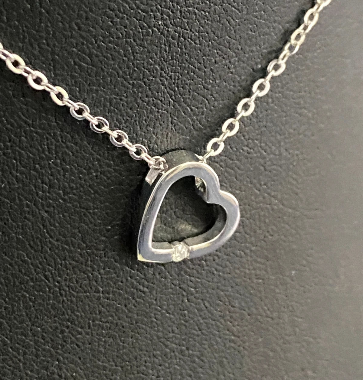 9K White Gold & Diamond Tension Set Heart Pendant