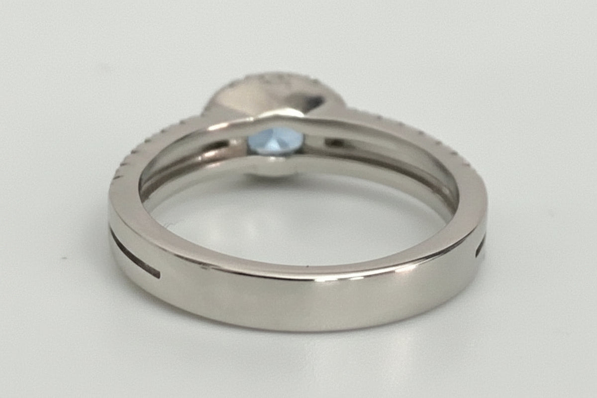 18ct White Gold Sapphire & 0.32ct Diamond Halo Engagement Ring