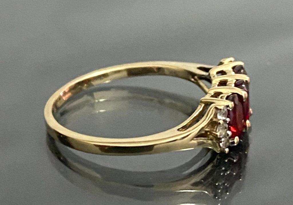 9ct Yellow Gold with 0.93CT Ruby Three Stone Ring Size K 1/2 (US 5.5)