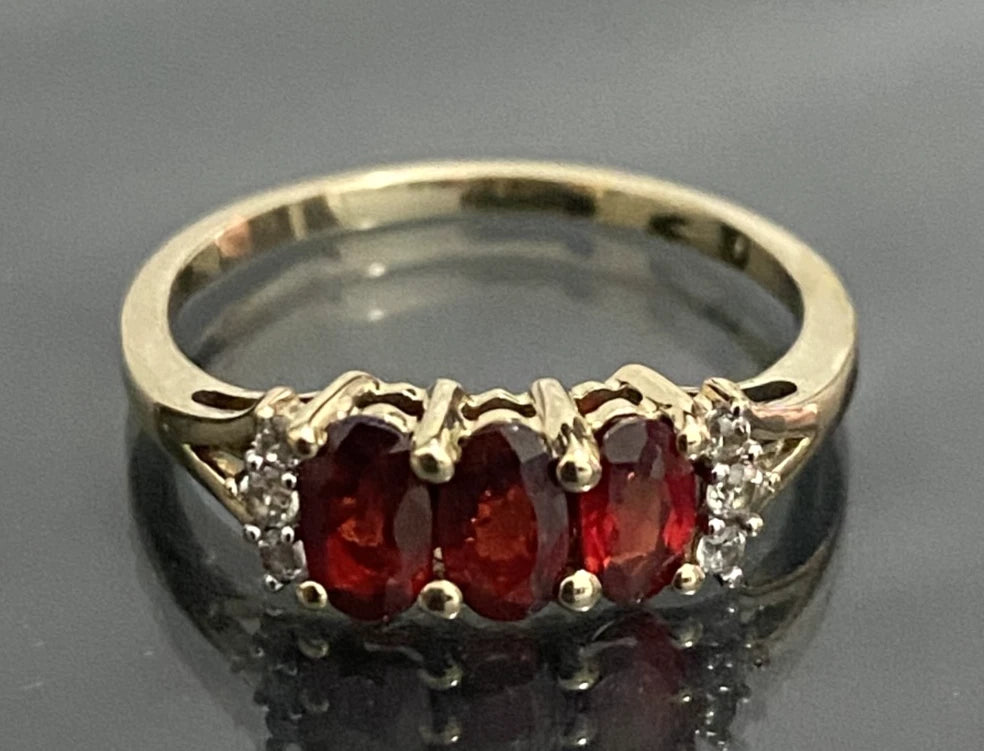 9ct Yellow Gold with 0.93CT Ruby Three Stone Ring Size K 1/2 (US 5.5)