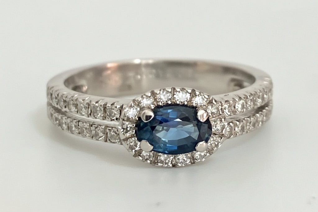 18ct White Gold Sapphire & 0.32ct Diamond Halo Engagement Ring