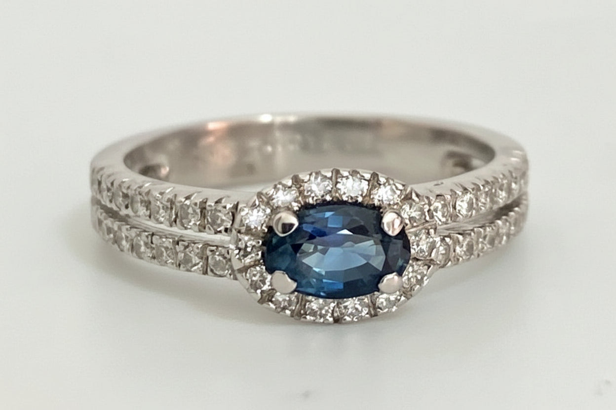 18ct White Gold Sapphire & 0.32ct Diamond Halo Engagement Ring